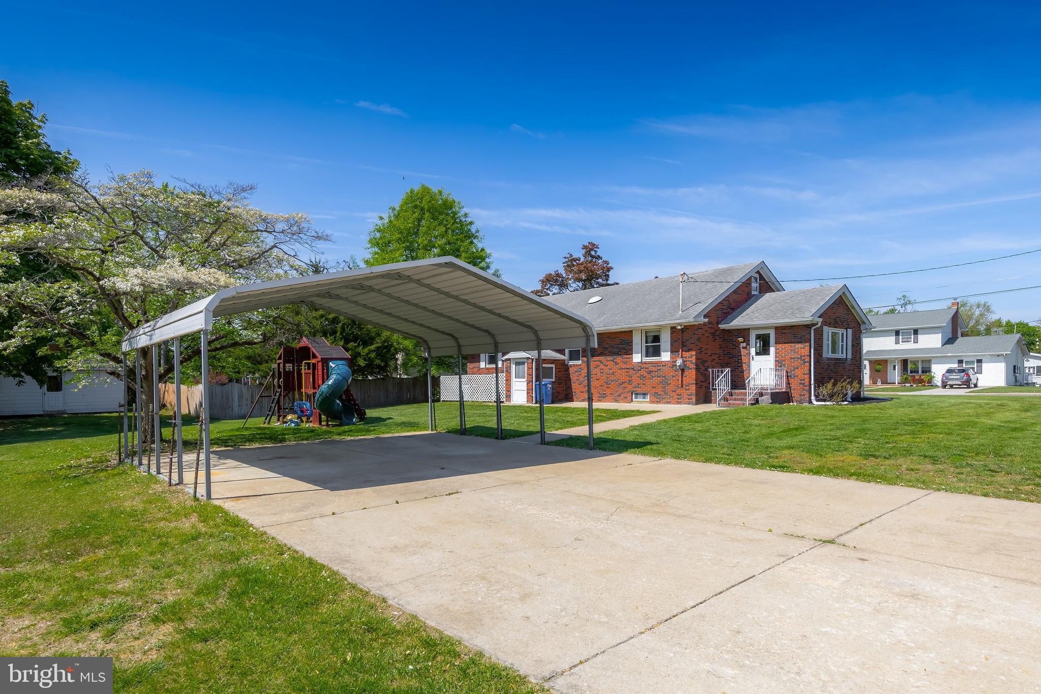121 Kansas Road Pennsville, NJ 08070 - Photo 22 of 32 a view of a yard in front of house