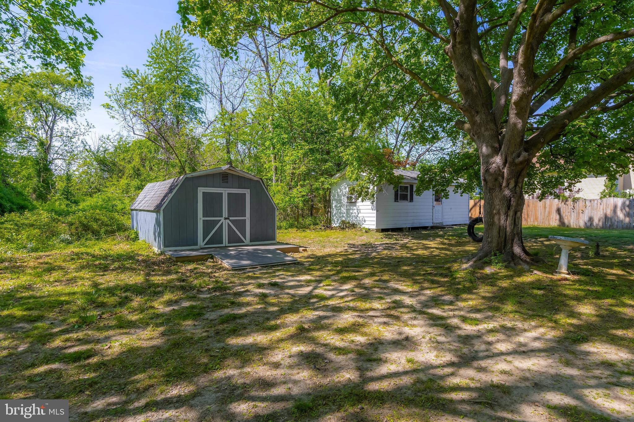 121 Kansas Road Pennsville, NJ 08070 - Photo 25 of 32 a house view with a trees