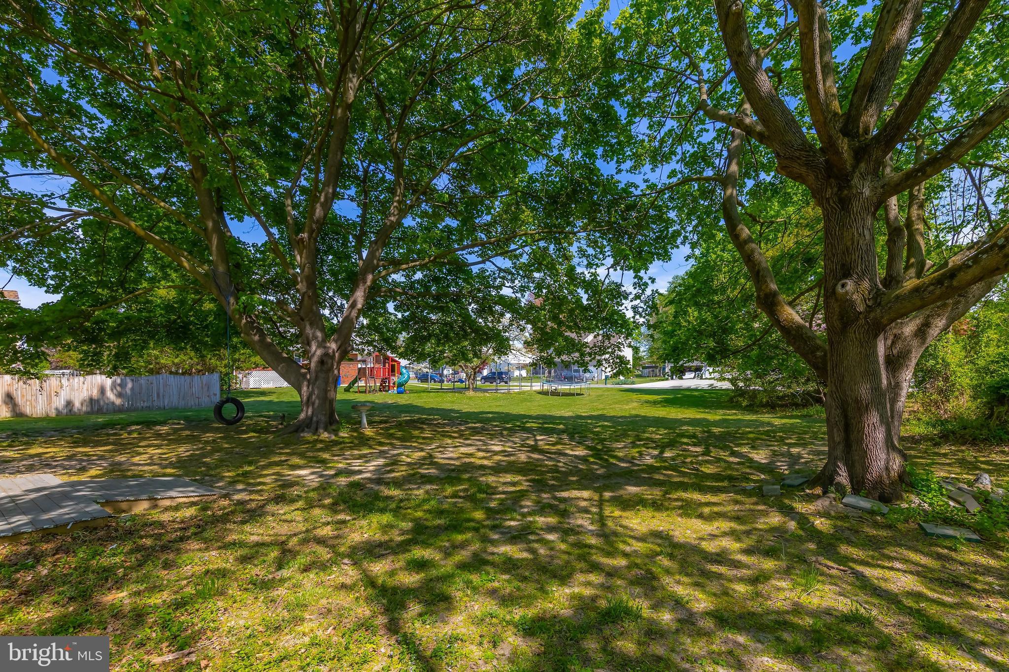 121 Kansas Road Pennsville, NJ 08070 - Photo 29 of 32 a view of a yard with a tree