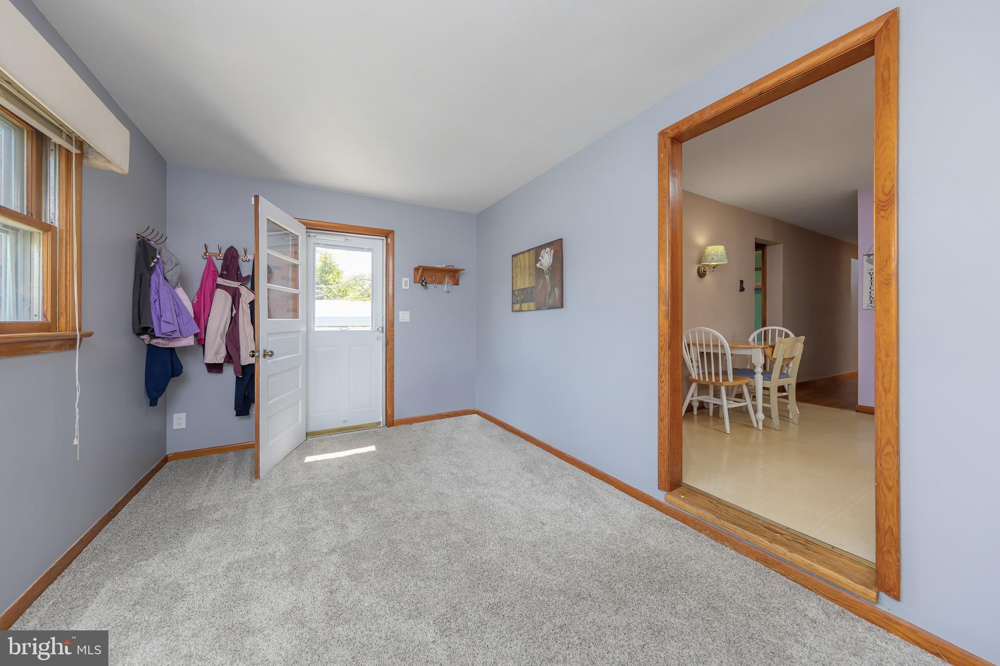 121 Kansas Road Pennsville, NJ 08070 - Photo 10 of 32 an empty room and a window in a room