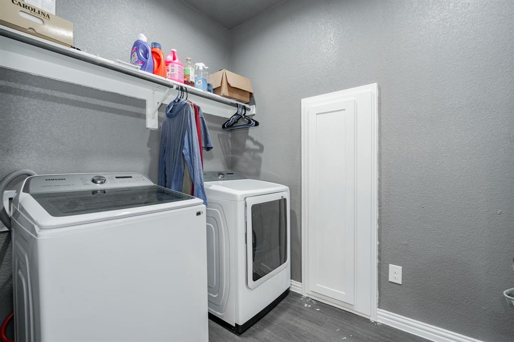 641 Countess Road Quinlan, TX 75474 - Photo 20 of 35 a utility room with dryer and washer