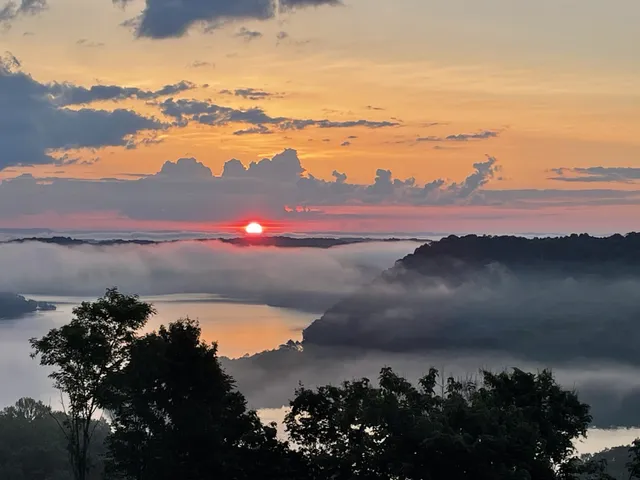 a view of lake with mountain