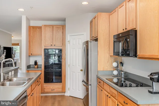 a bathroom with a toilet sink and vanity