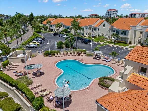 an aerial view of a house with outdoor space