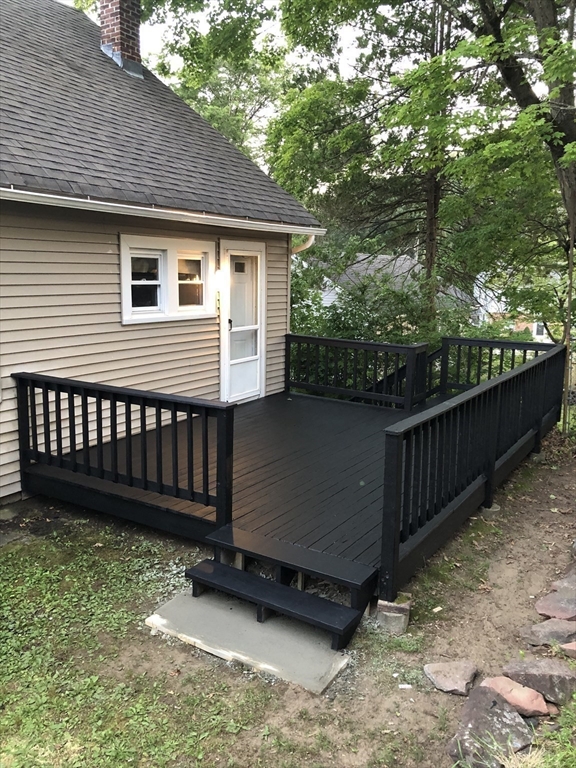 12 Carroll Street Springfield, MA 01108 - Photo 6 of 13 a view of a small wooden deck