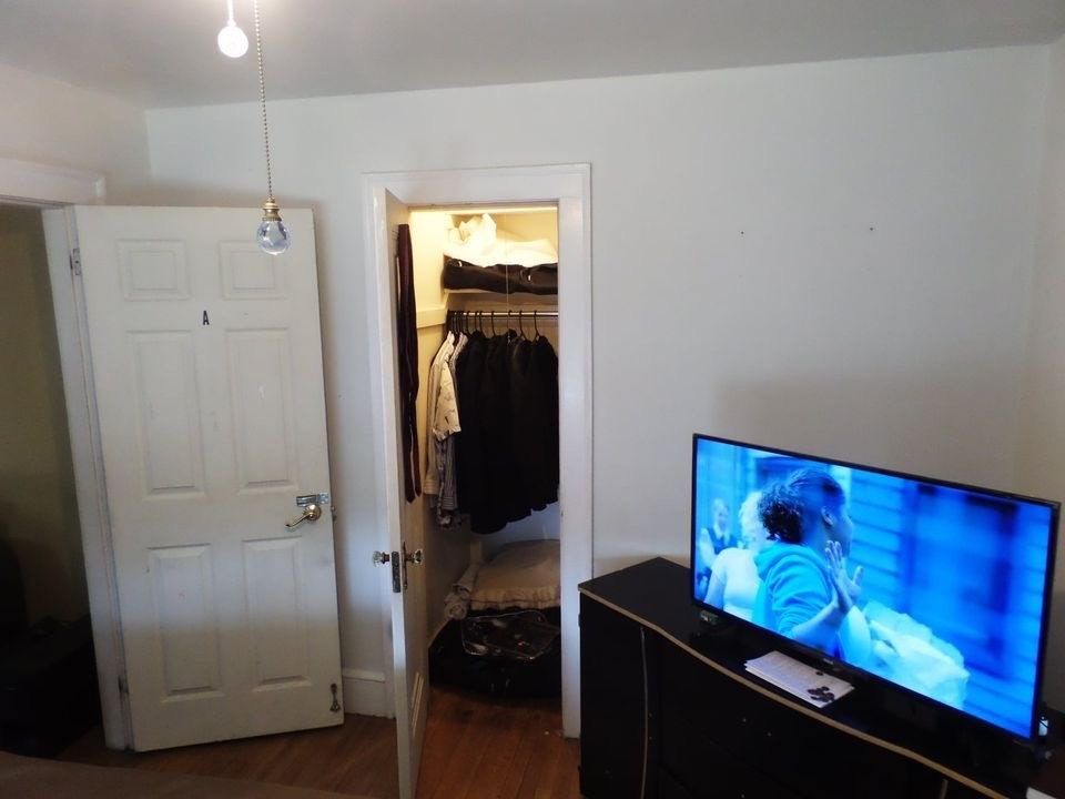 12 Carroll Street Springfield, MA 01108 - Photo 9 of 13 a view of a hallway with closet