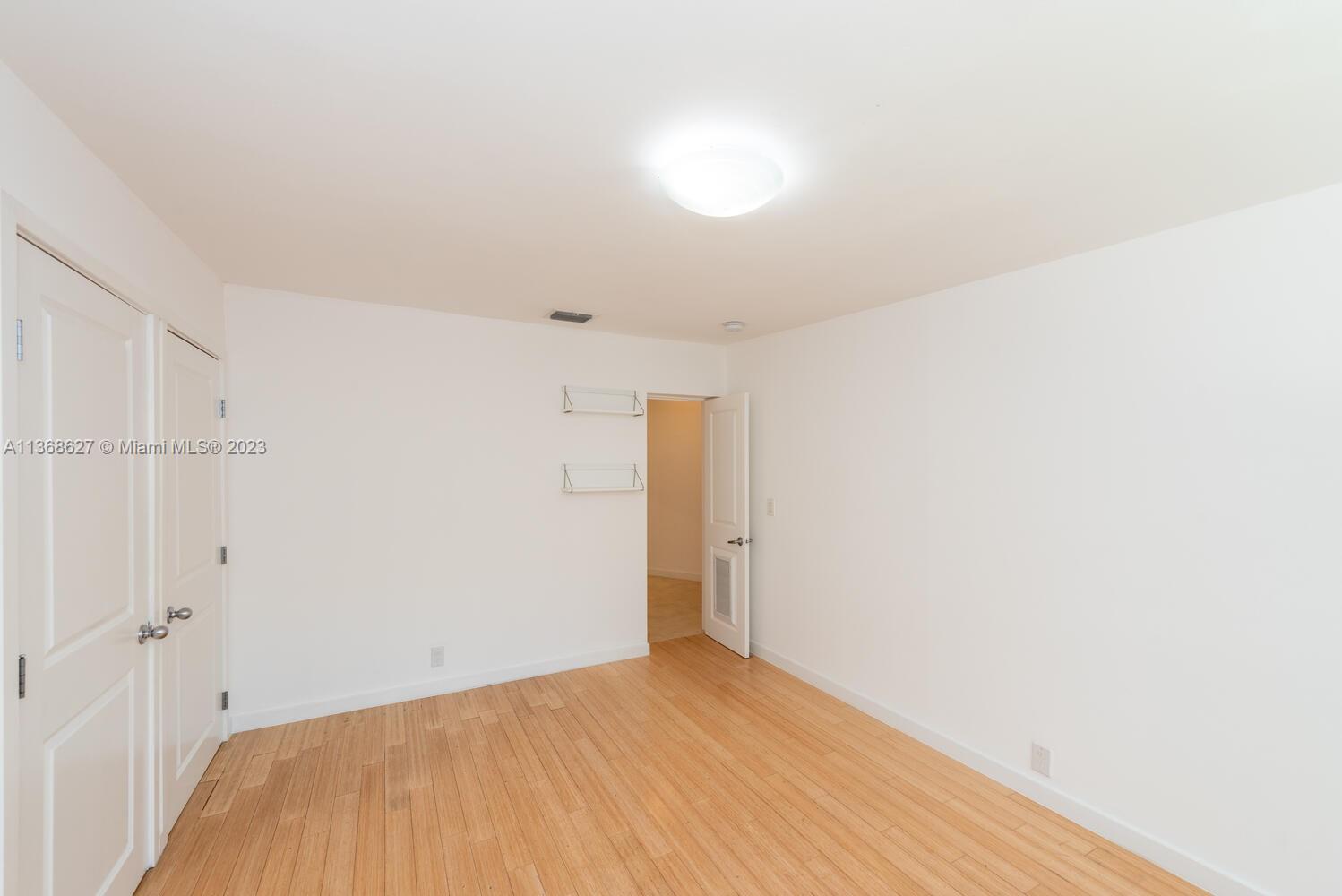 265 Ridgewood Road Key Biscayne, FL 33149 - Photo 15 of 25 a view of empty room