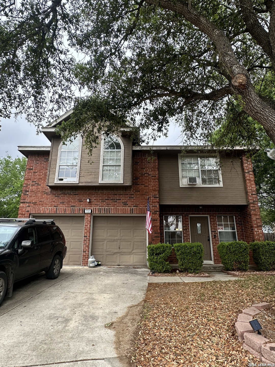 7731 Fallen Pine Converse, TX 78109 - Photo 1 of 1 a front view of a house with a yard