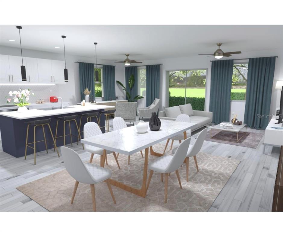 30 Ebb Circle Placida, FL 33946 - Photo 6 of 7 a dining room with a wooden table and chairs