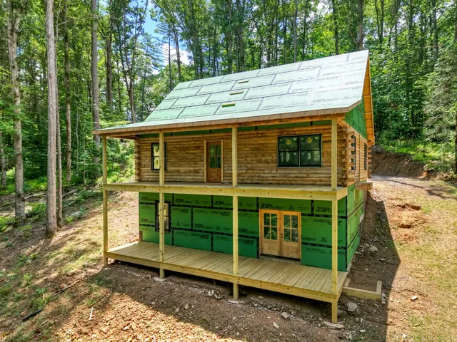 a front view of a house with street