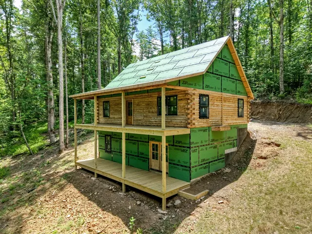 a backyard of a house with wooden floor yard barbeque oven and outdoor seating