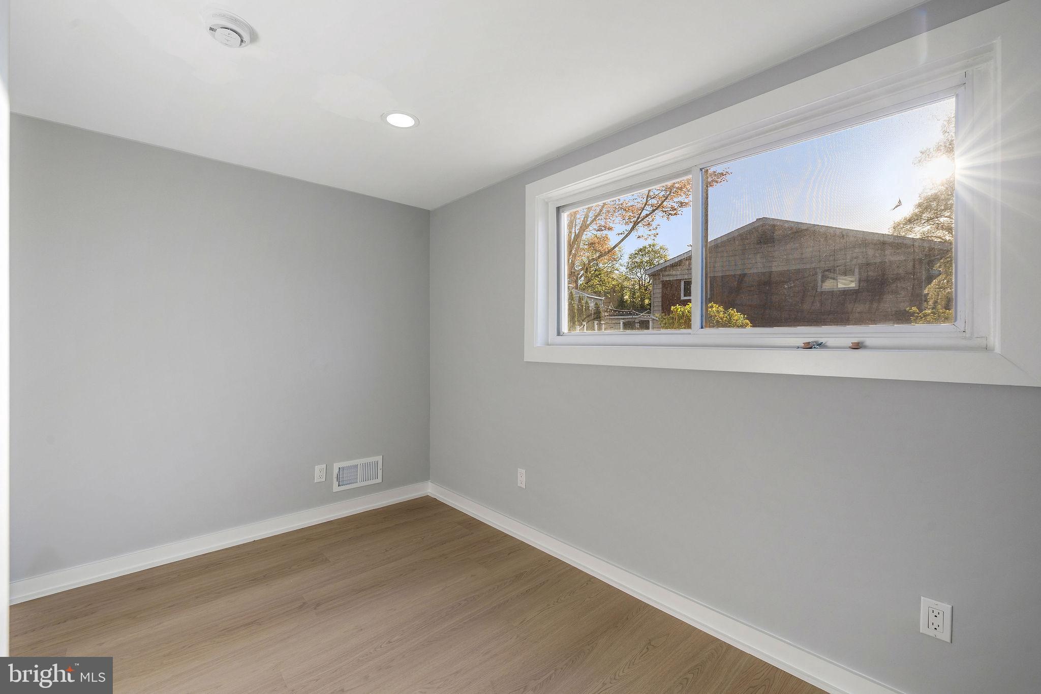 2209 Ellis Street Silver Spring, MD 20910 - Photo 34 of 49 a view of an empty room with a window