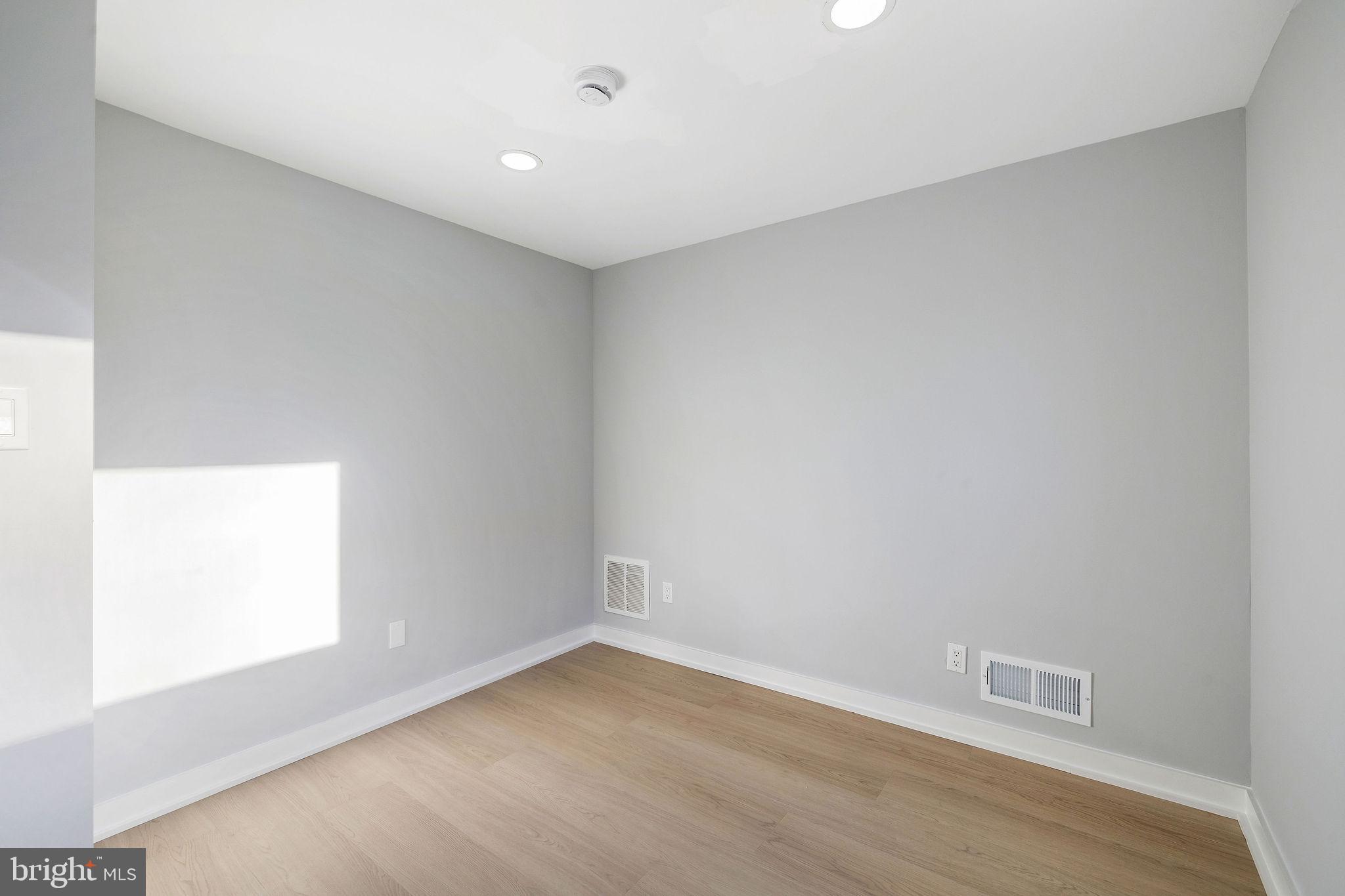 2209 Ellis Street Silver Spring, MD 20910 - Photo 35 of 49 a view of an empty room with a window
