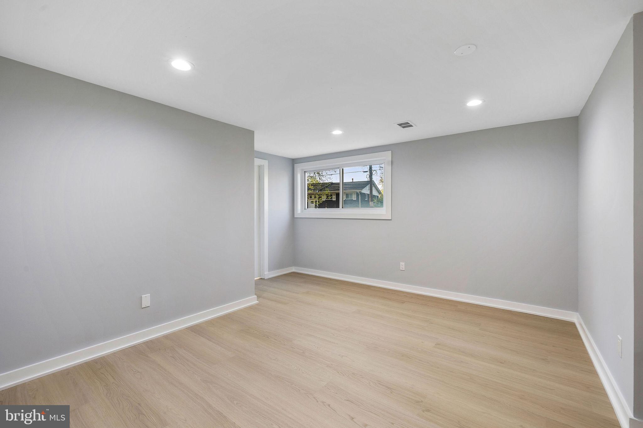 2209 Ellis Street Silver Spring, MD 20910 - Photo 40 of 49 a view of an empty room with a window