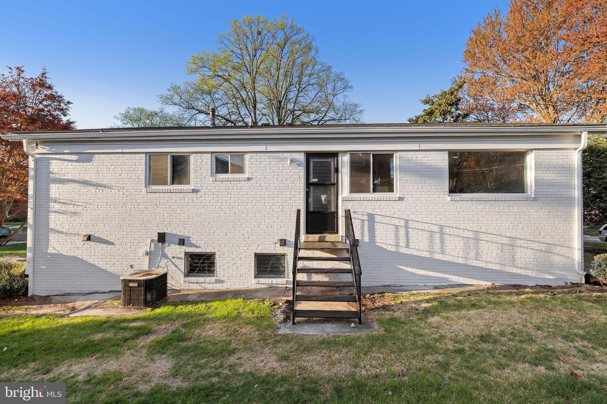 2209 Ellis Street Silver Spring, MD 20910 - Photo 45 of 49 front view of a house with a yard