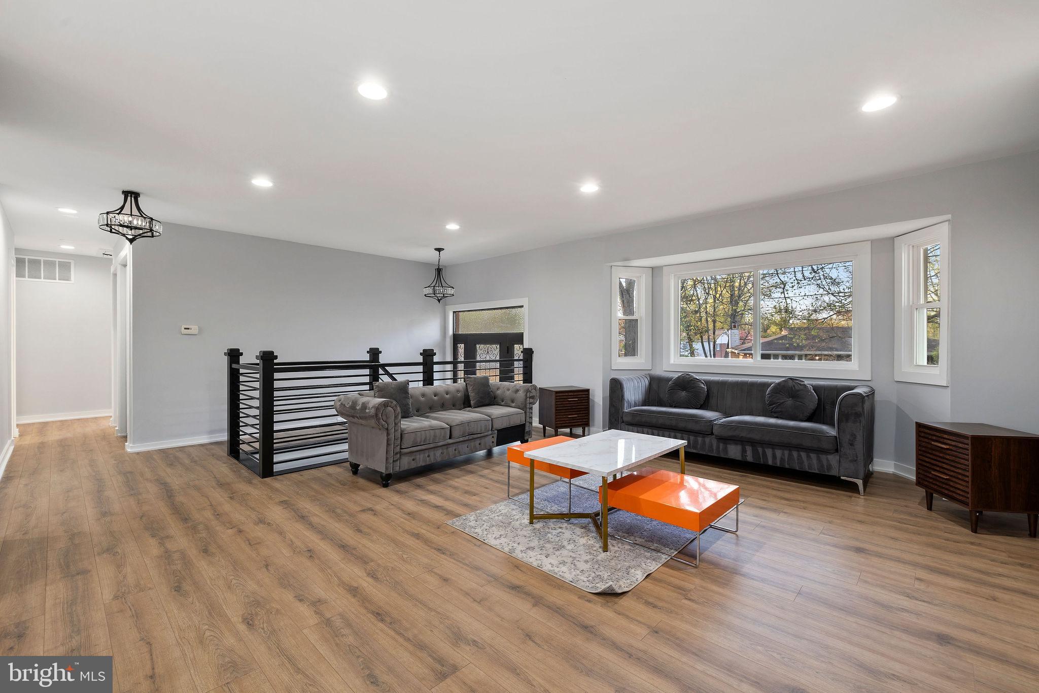 2209 Ellis Street Silver Spring, MD 20910 - Photo 6 of 49 a living room with furniture and wooden floor