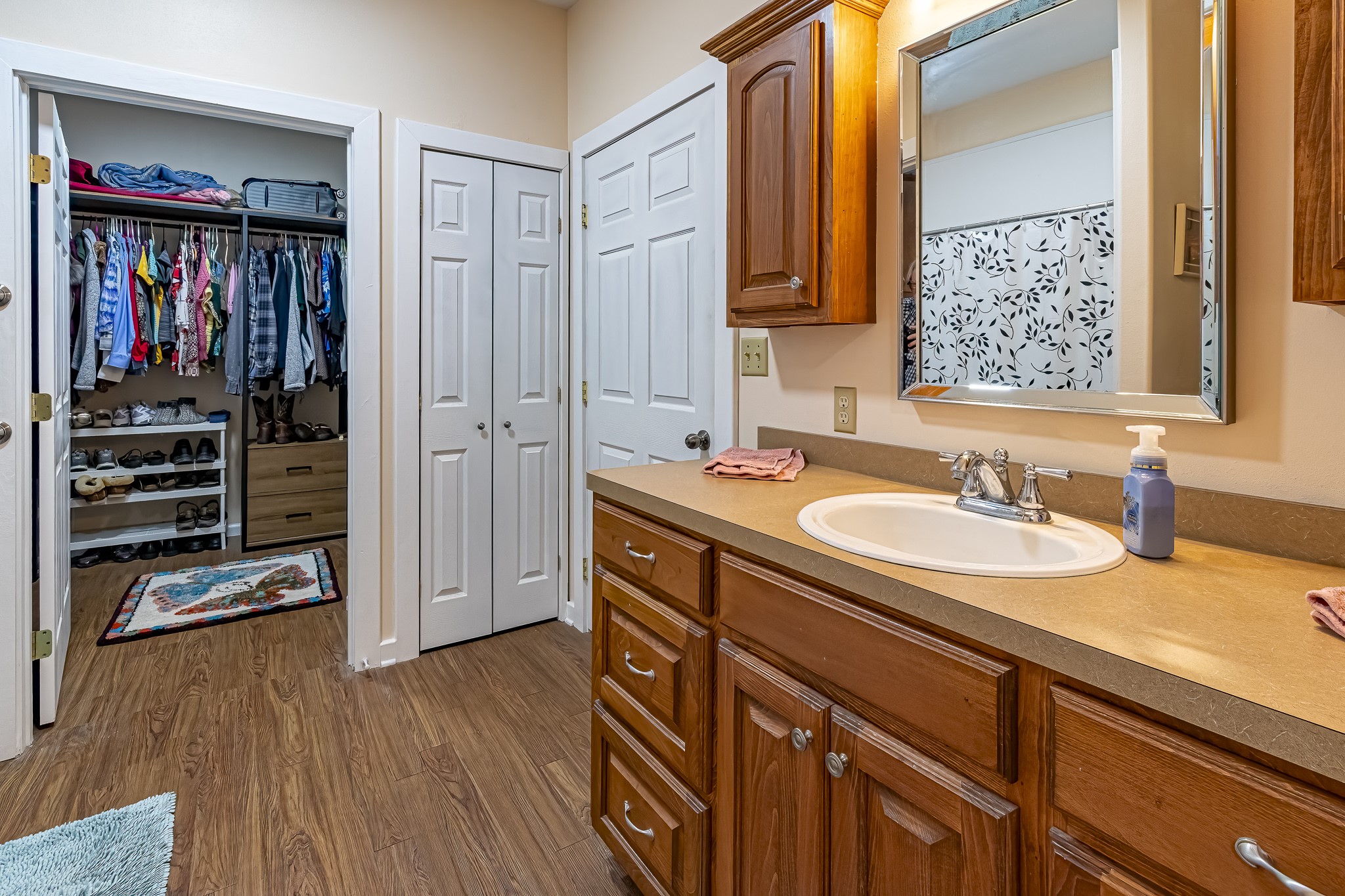 188 Pullin Road Corrigan, TX 75939 - Photo 19 of 50 a bathroom with a sink a vanity and a mirror