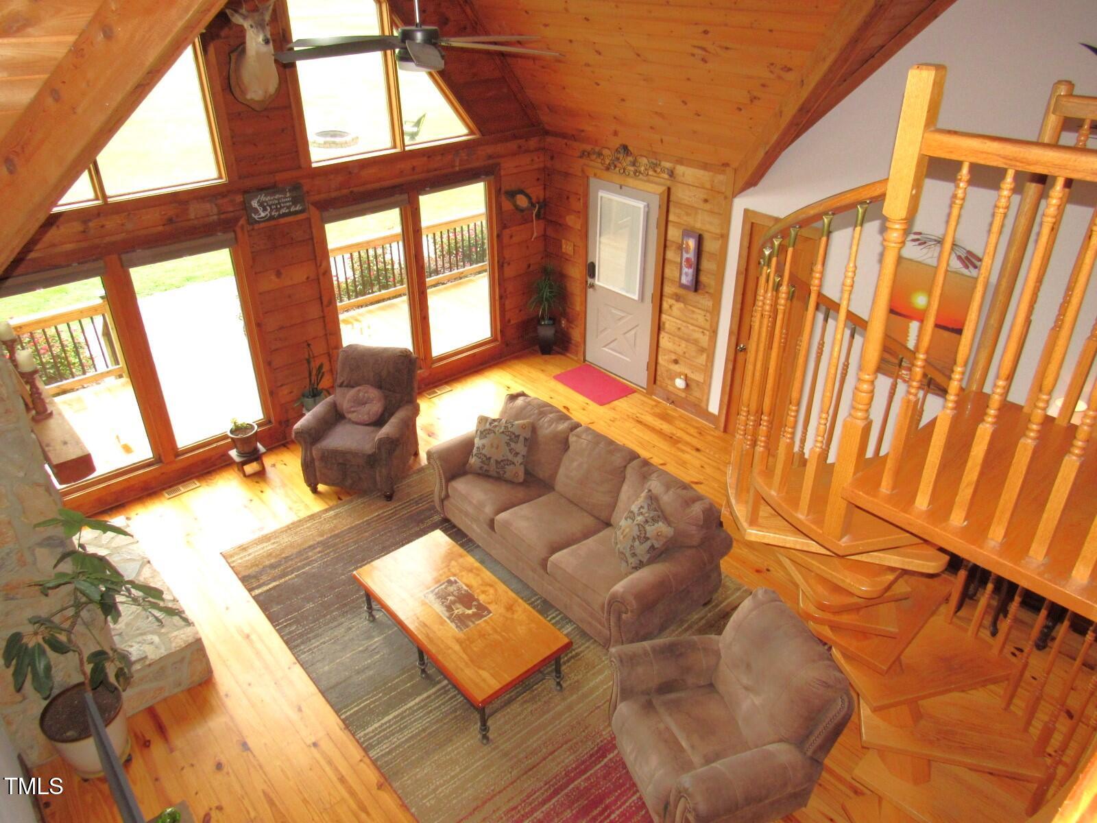 1159 Flemingtown Road Henderson, NC 27537 - Photo 21 of 51 a living room with furniture and a large window