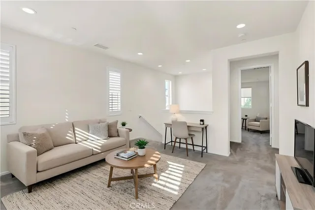 a bathroom with a granite countertop sink a toilet and a bathtub