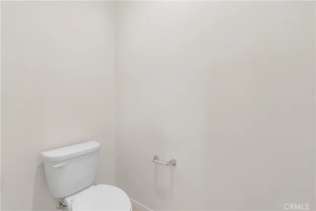 a swimming pool view with a outdoor seating