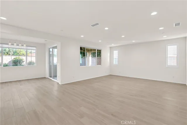 a kitchen with stainless steel appliances granite countertop a sink and a granite counter tops