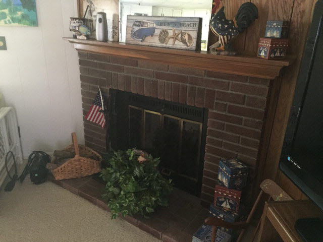 1220 Chagrin Drive Lillian, AL 36549 - Photo 7 of 22 Wood burning fire pl