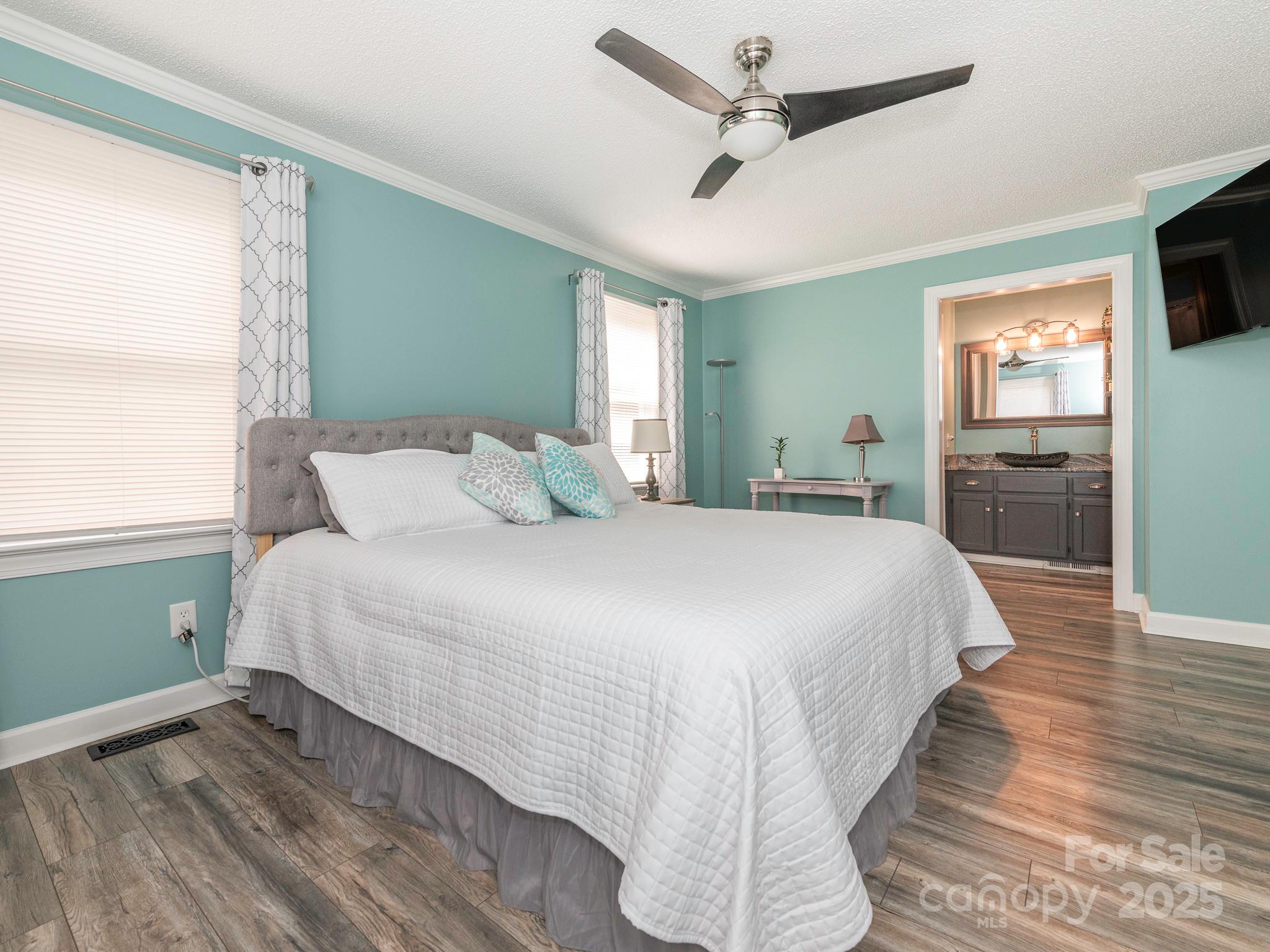 3022 Crestview Lane Lancaster, SC 29720 - Photo 24 of 46 a bedroom with a bed and a flat screen tv