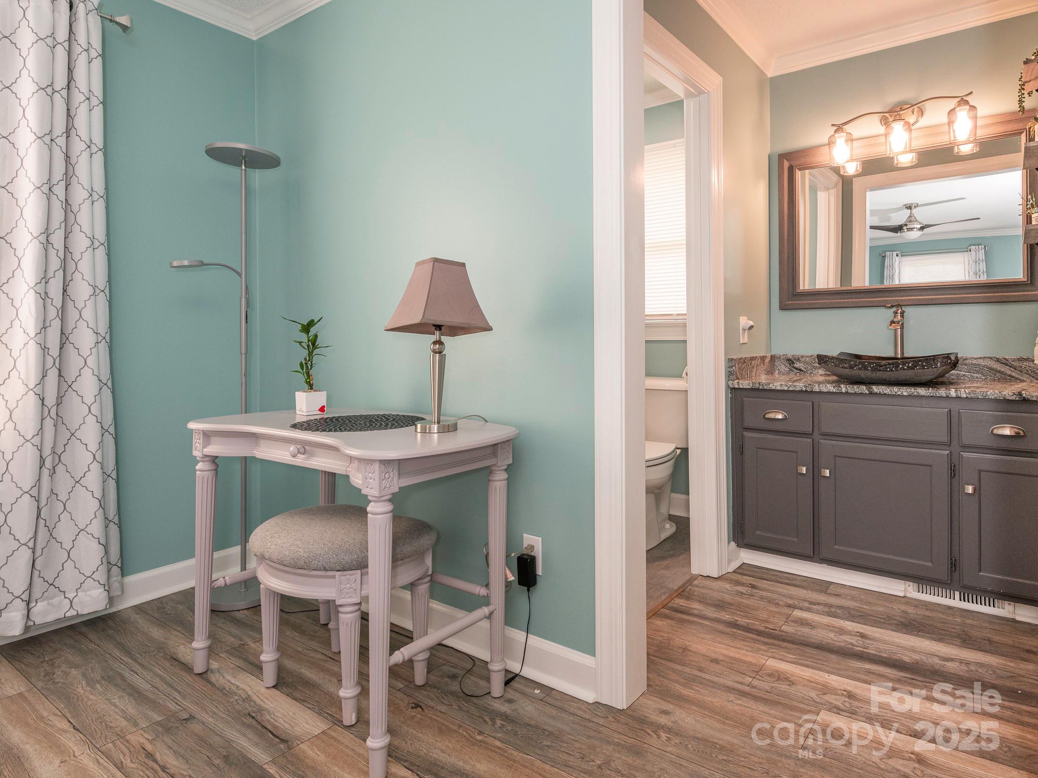 3022 Crestview Lane Lancaster, SC 29720 - Photo 26 of 46 a kitchen with a sink cabinets and wooden floor