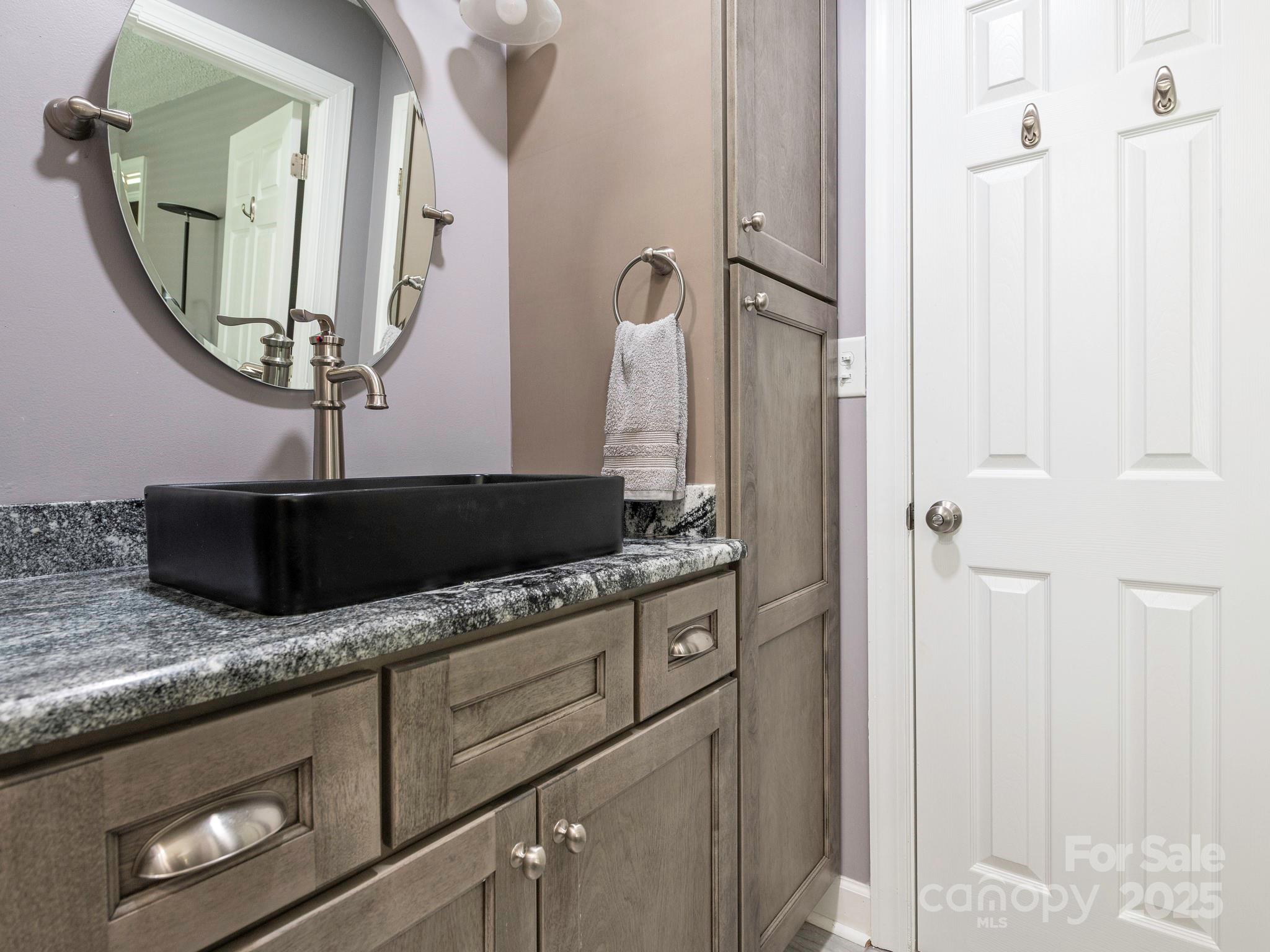 3022 Crestview Lane Lancaster, SC 29720 - Photo 33 of 46 a bathroom with sinks granite and a mirror