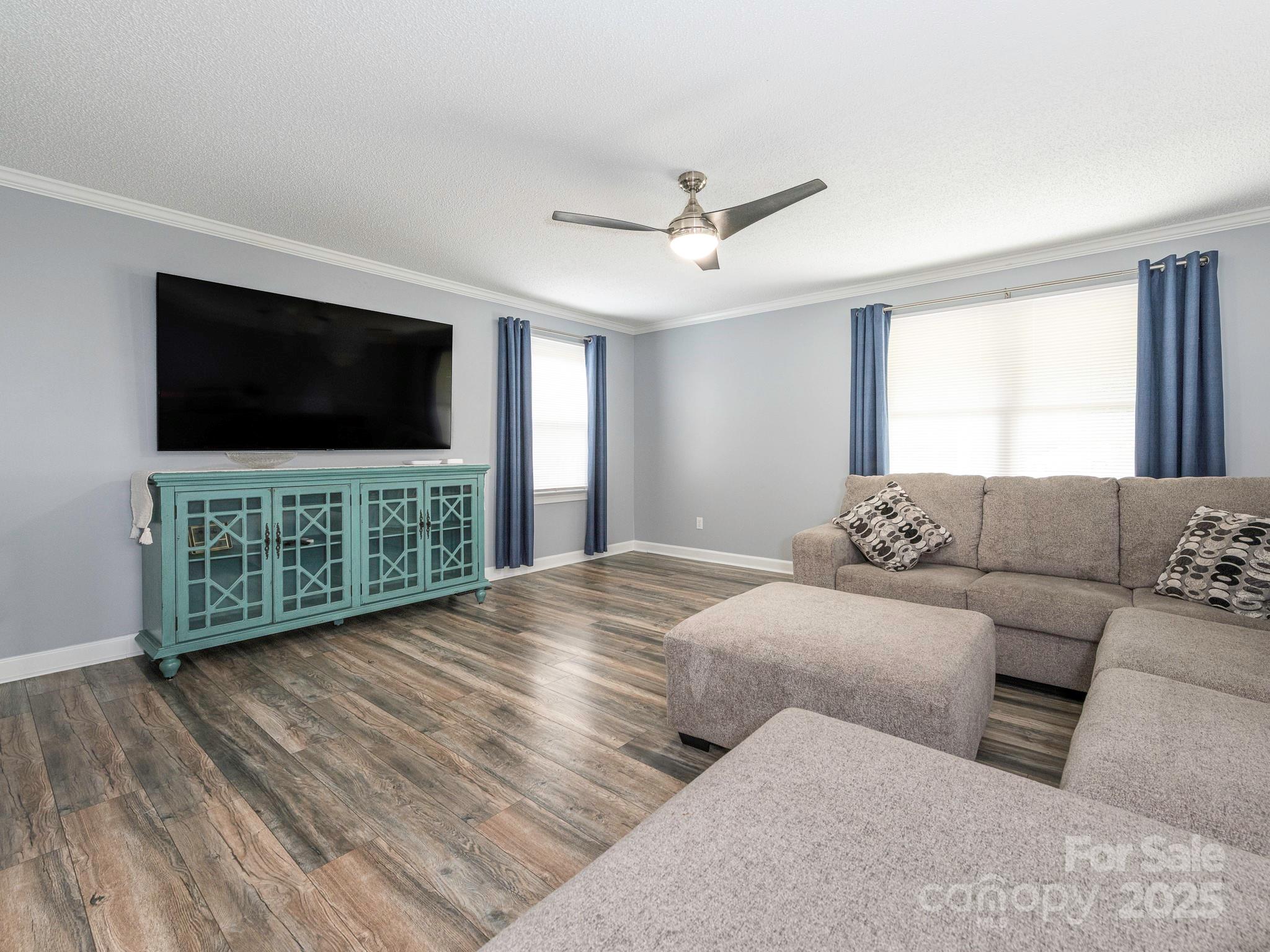 3022 Crestview Lane Lancaster, SC 29720 - Photo 4 of 46 a living room with furniture and a flat screen tv