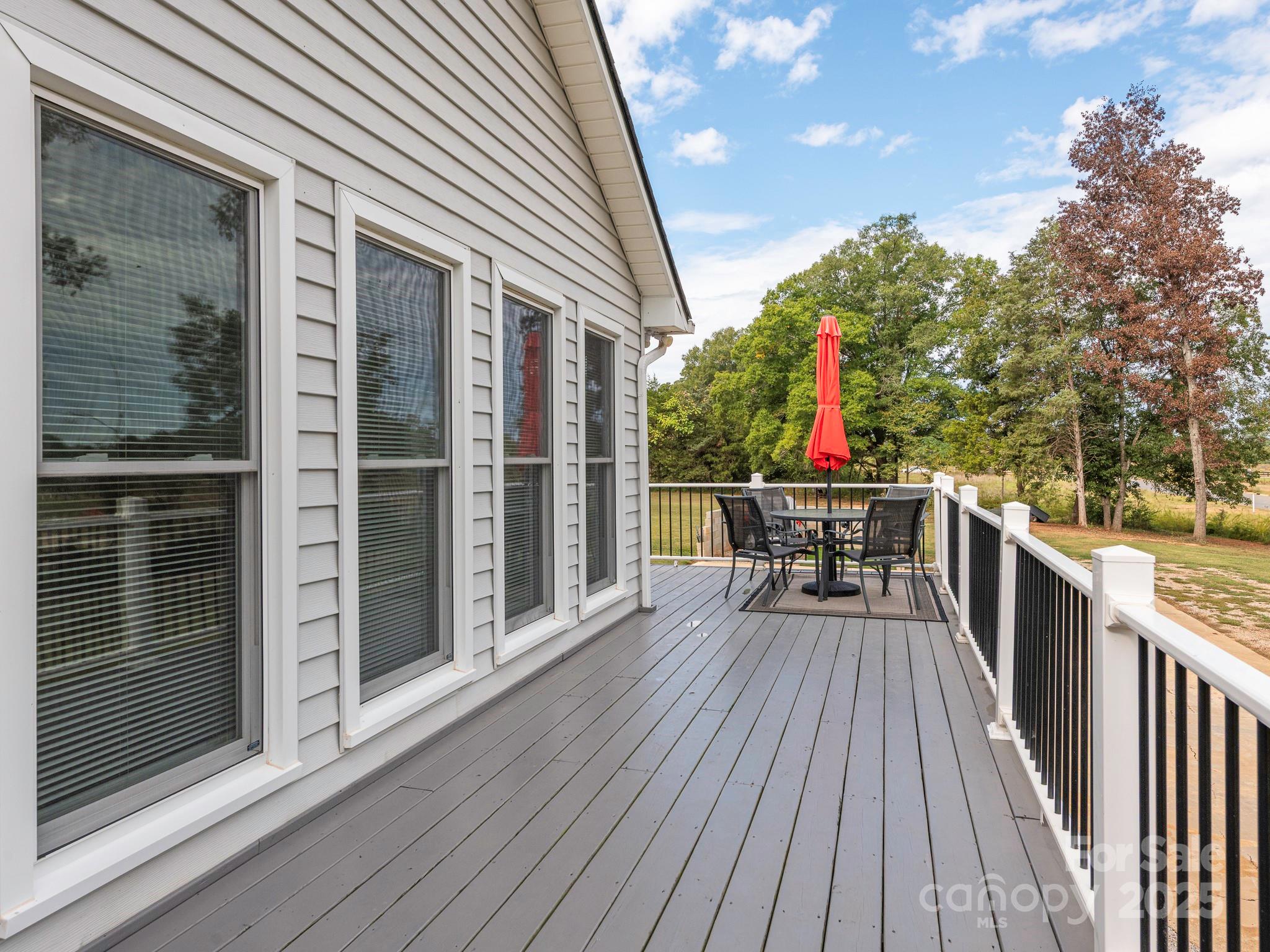 3022 Crestview Lane Lancaster, SC 29720 - Photo 42 of 46 a balcony with wooden floor and outdoor seating