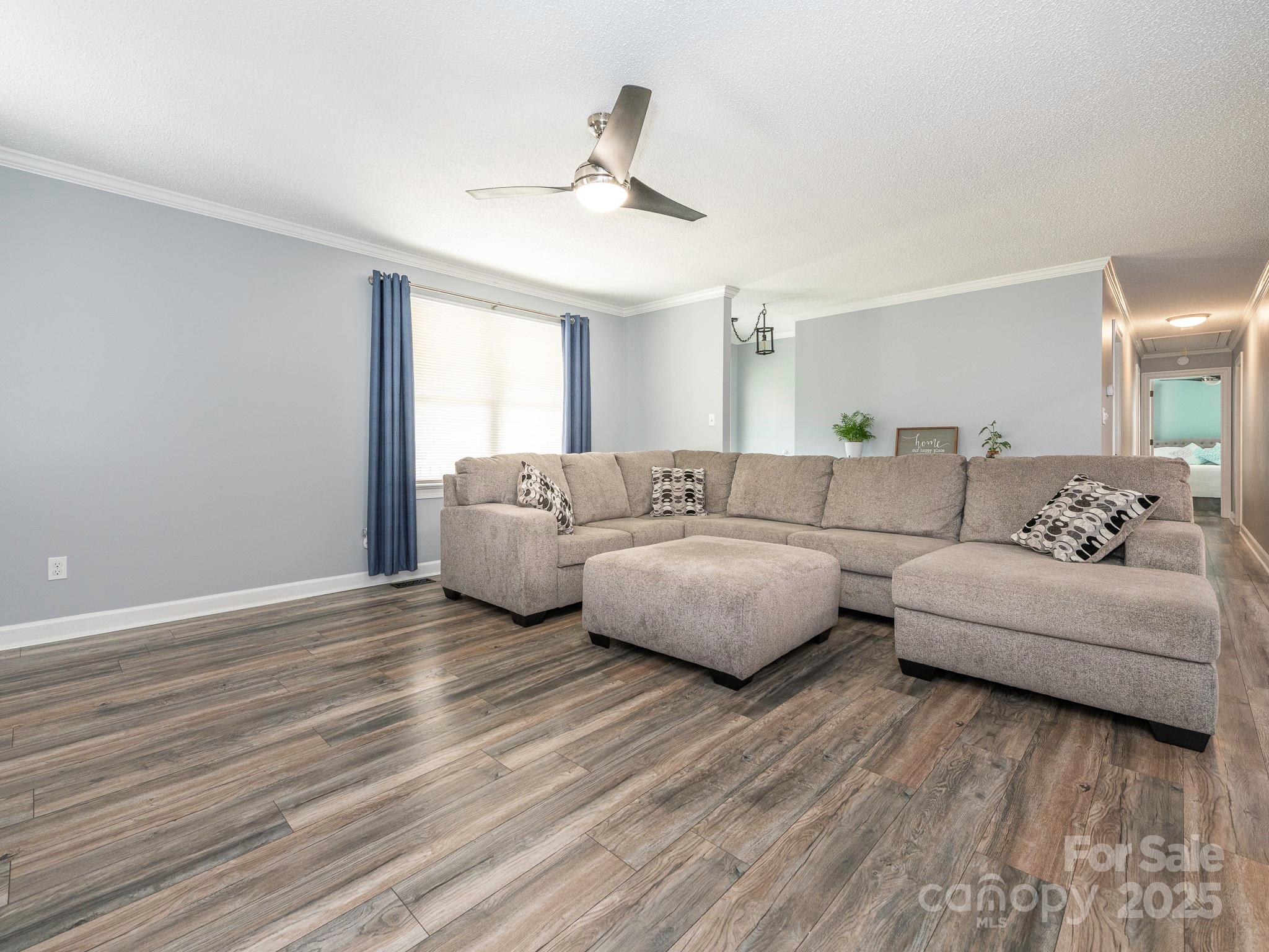 3022 Crestview Lane Lancaster, SC 29720 - Photo 10 of 46 a living room with furniture and a wooden floor