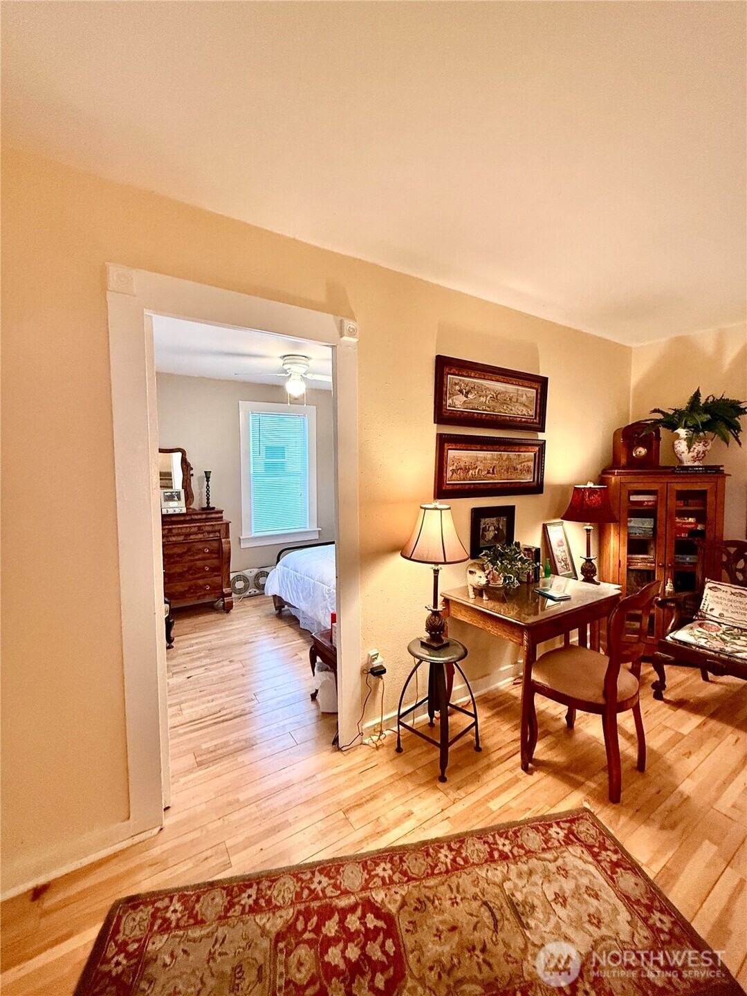 213 East Oak Street Dayton, WA 99328 - Photo 4 of 27 a living room with furniture a rug and a wooden floor