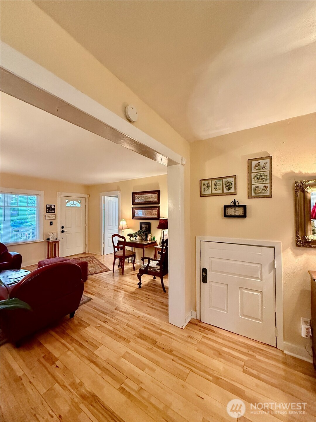213 East Oak Street Dayton, WA 99328 - Photo 7 of 27 a living room with furniture and a dining table with kitchen view