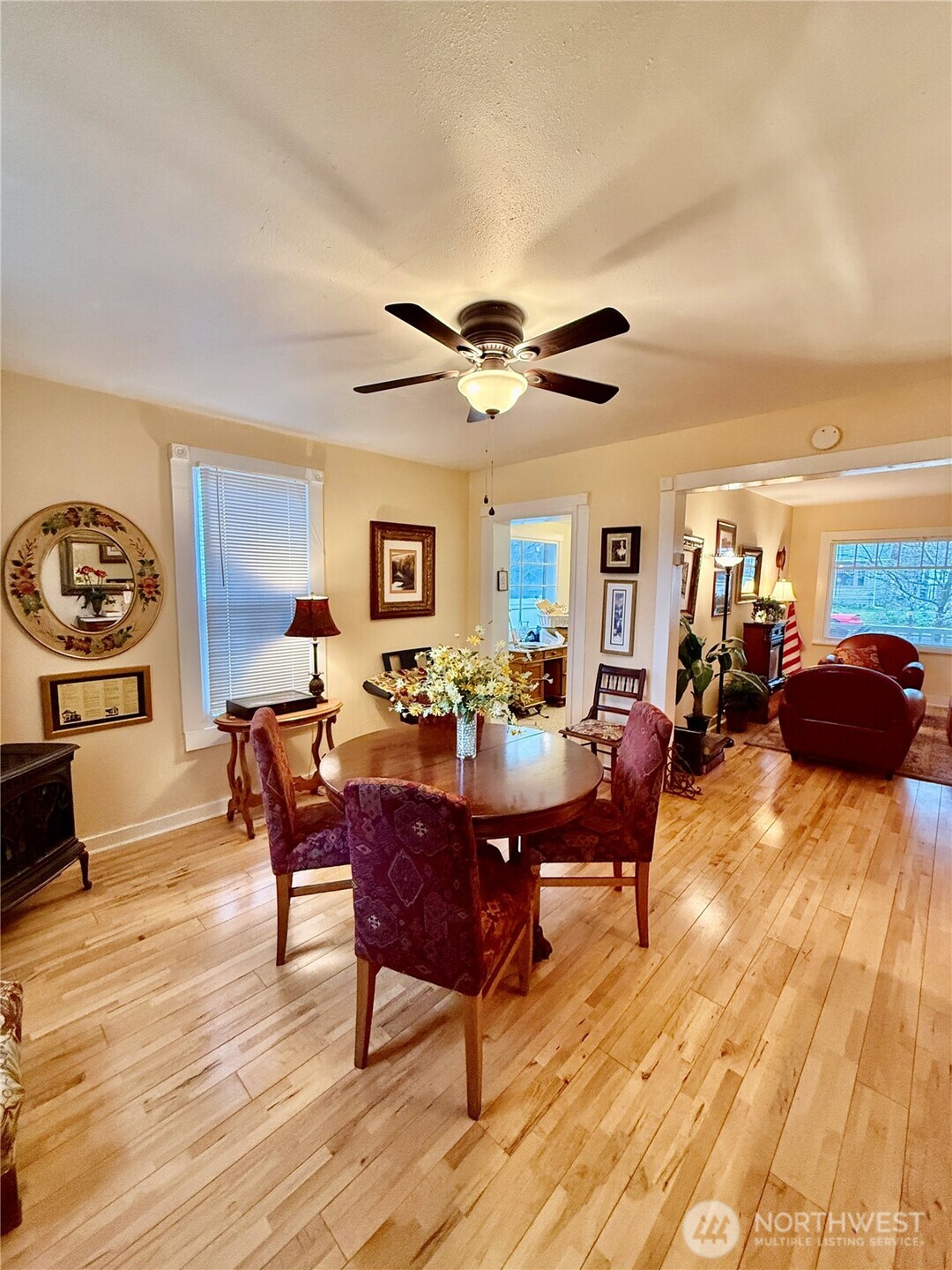 213 East Oak Street Dayton, WA 99328 - Photo 9 of 27 a view of a dining room with furniture window and wooden floor