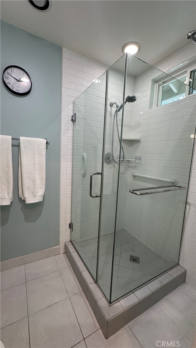 12111 Eddleston Drive Porter Ranch, CA 91326 - Photo 15 of 31 a bathroom with a shower