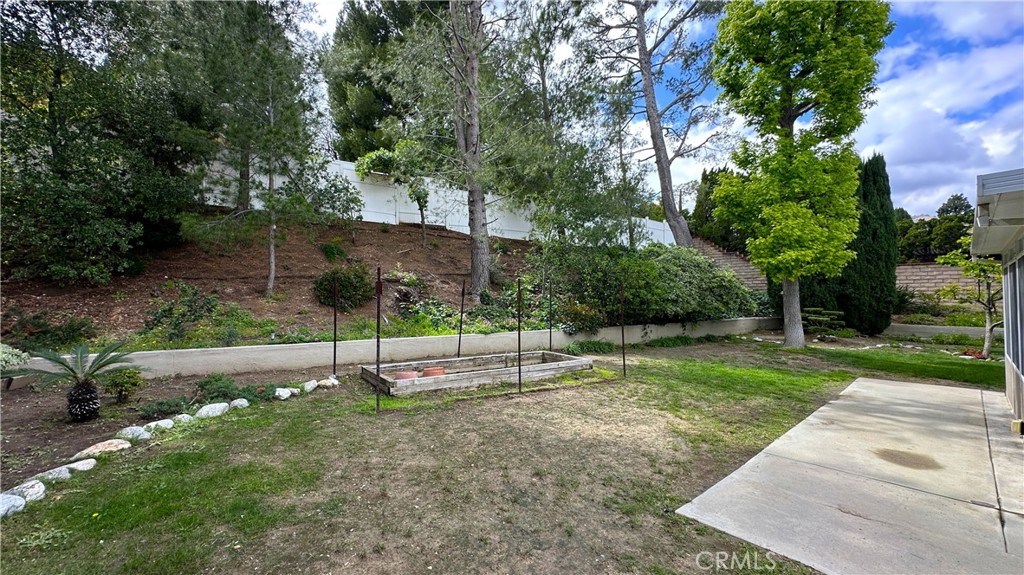 12111 Eddleston Drive Porter Ranch, CA 91326 - Photo 28 of 31 a house view with a park