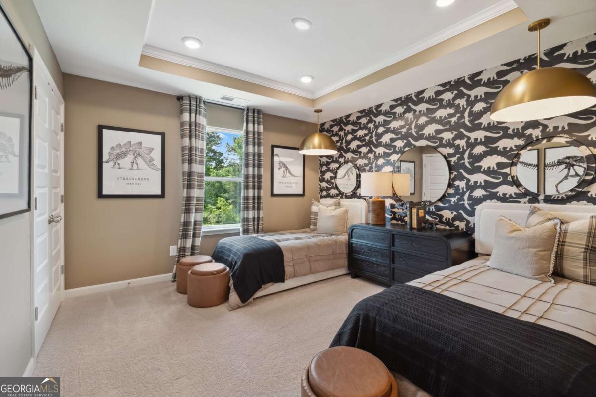 108 Compass Road Hampton, GA 30228 - Photo 30 of 51 a bedroom with furniture and a large window