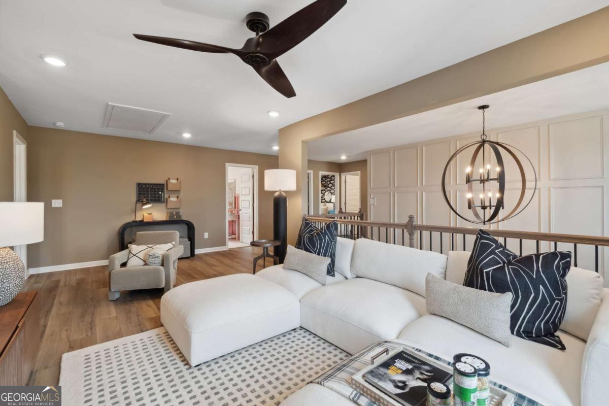 108 Compass Road Hampton, GA 30228 - Photo 35 of 51 a bedroom with furniture and a large window