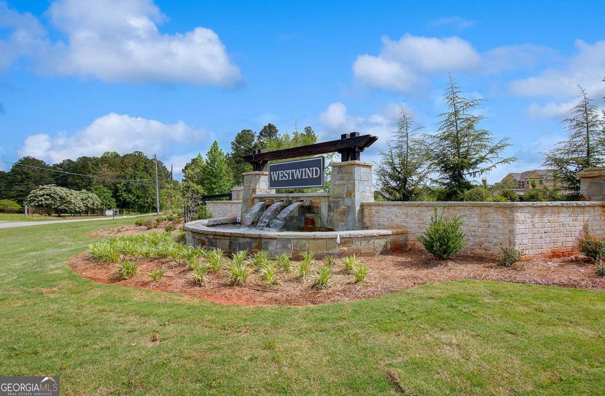 108 Compass Road Hampton, GA 30228 - Photo 49 of 51 a view of a garden with a bench in the garden