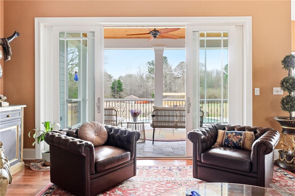 265 Honeysuckle Lane Temple, GA 30179 - Photo 11 of 45 a living room with furniture and a large window