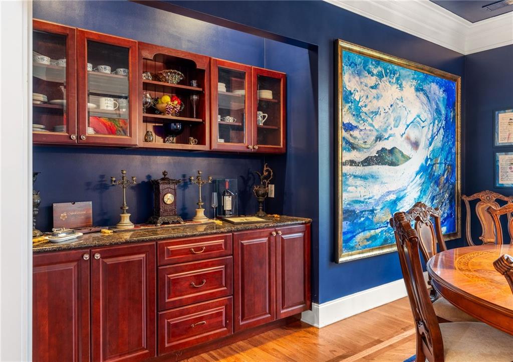 265 Honeysuckle Lane Temple, GA 30179 - Photo 16 of 45 a view of a dining room with furniture window and wooden floor