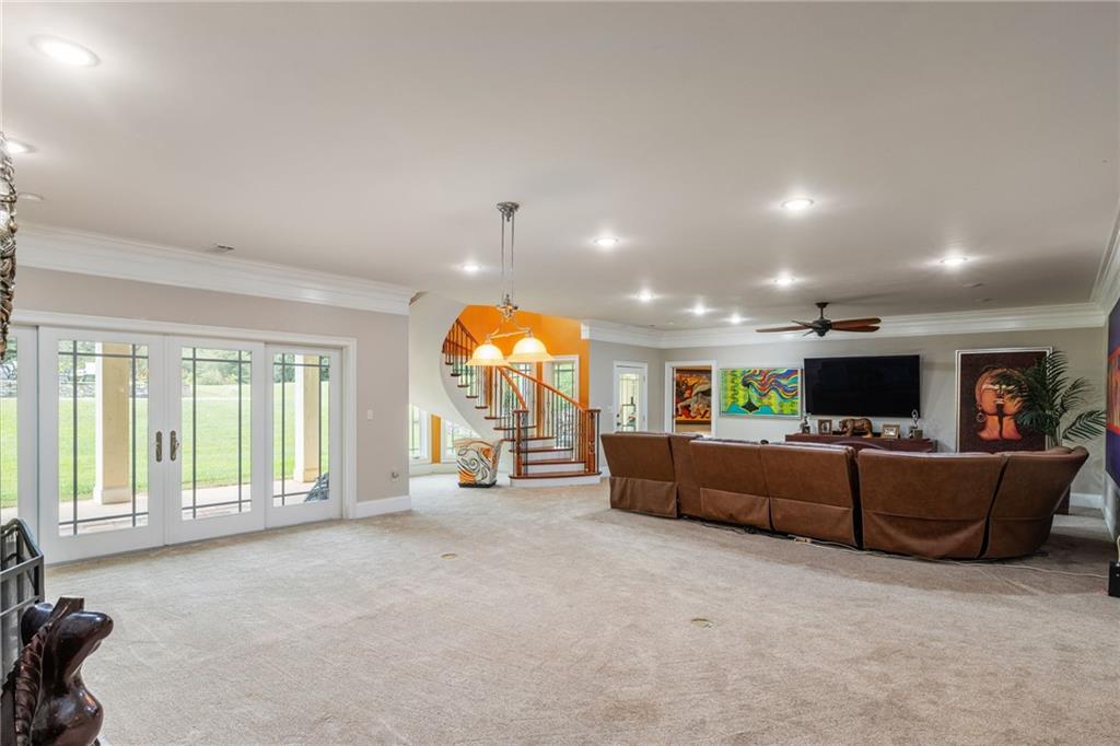 265 Honeysuckle Lane Temple, GA 30179 - Photo 30 of 45 a living room with furniture and a large window