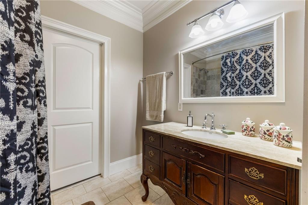 265 Honeysuckle Lane Temple, GA 30179 - Photo 34 of 45 a bathroom with a sink and a mirror