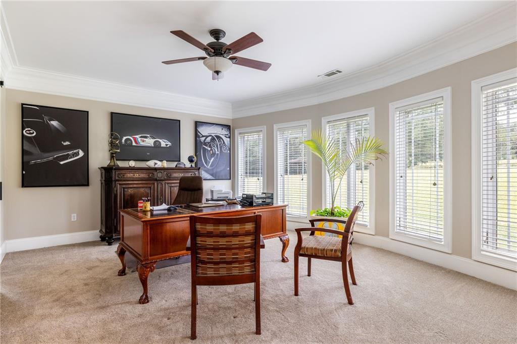 265 Honeysuckle Lane Temple, GA 30179 - Photo 35 of 45 a living room with furniture and a window