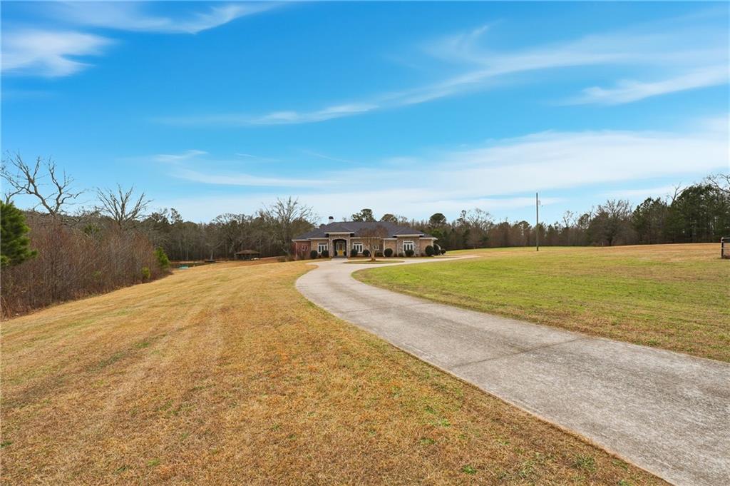 265 Honeysuckle Lane Temple, GA 30179 - Photo 44 of 45 a view of a lake with a city view