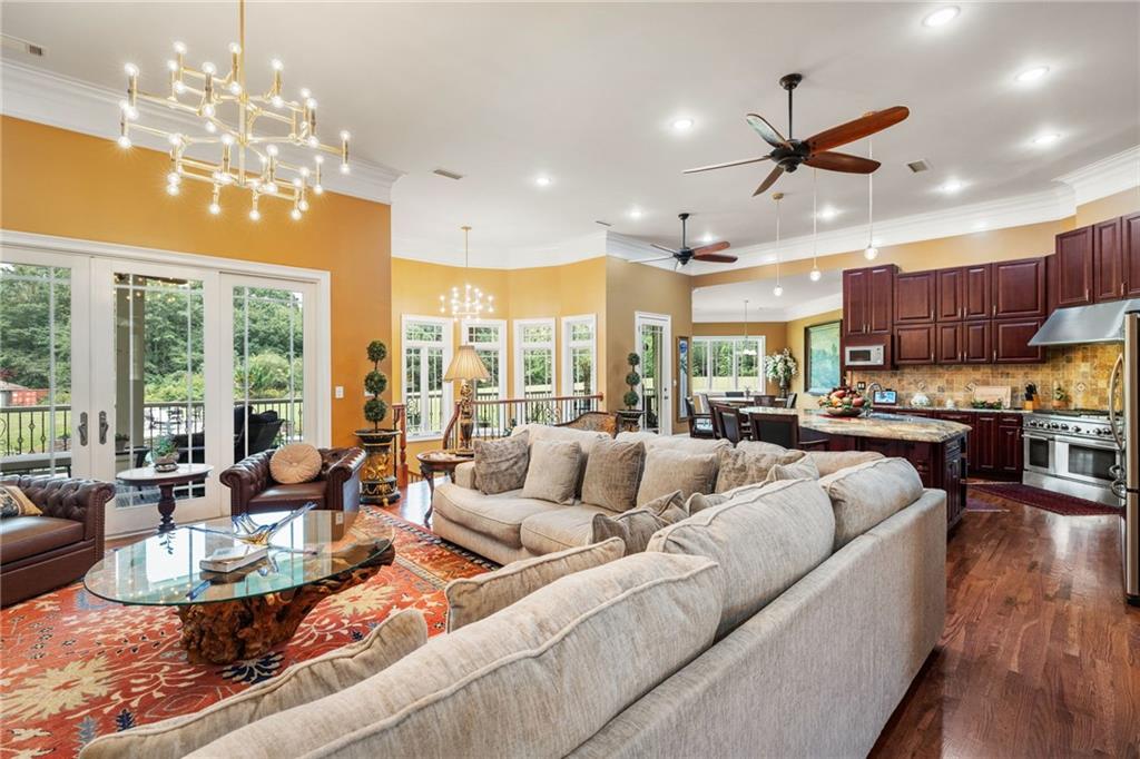 265 Honeysuckle Lane Temple, GA 30179 - Photo 7 of 45 a living room with furniture kitchen and a large window
