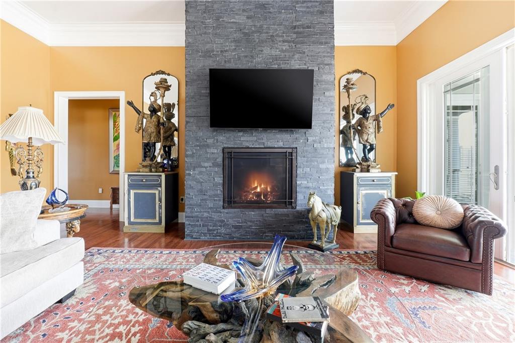 265 Honeysuckle Lane Temple, GA 30179 - Photo 10 of 45 a living room with furniture and a fireplace