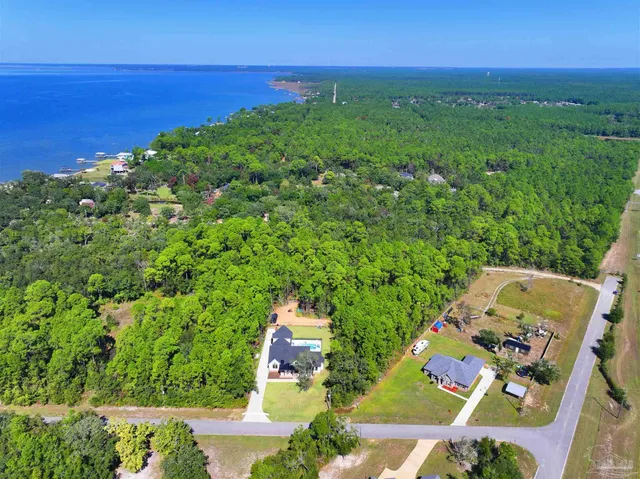 a view of a swimming pool with an ocean view
