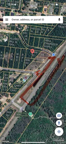 a sign on the wall next to a yard